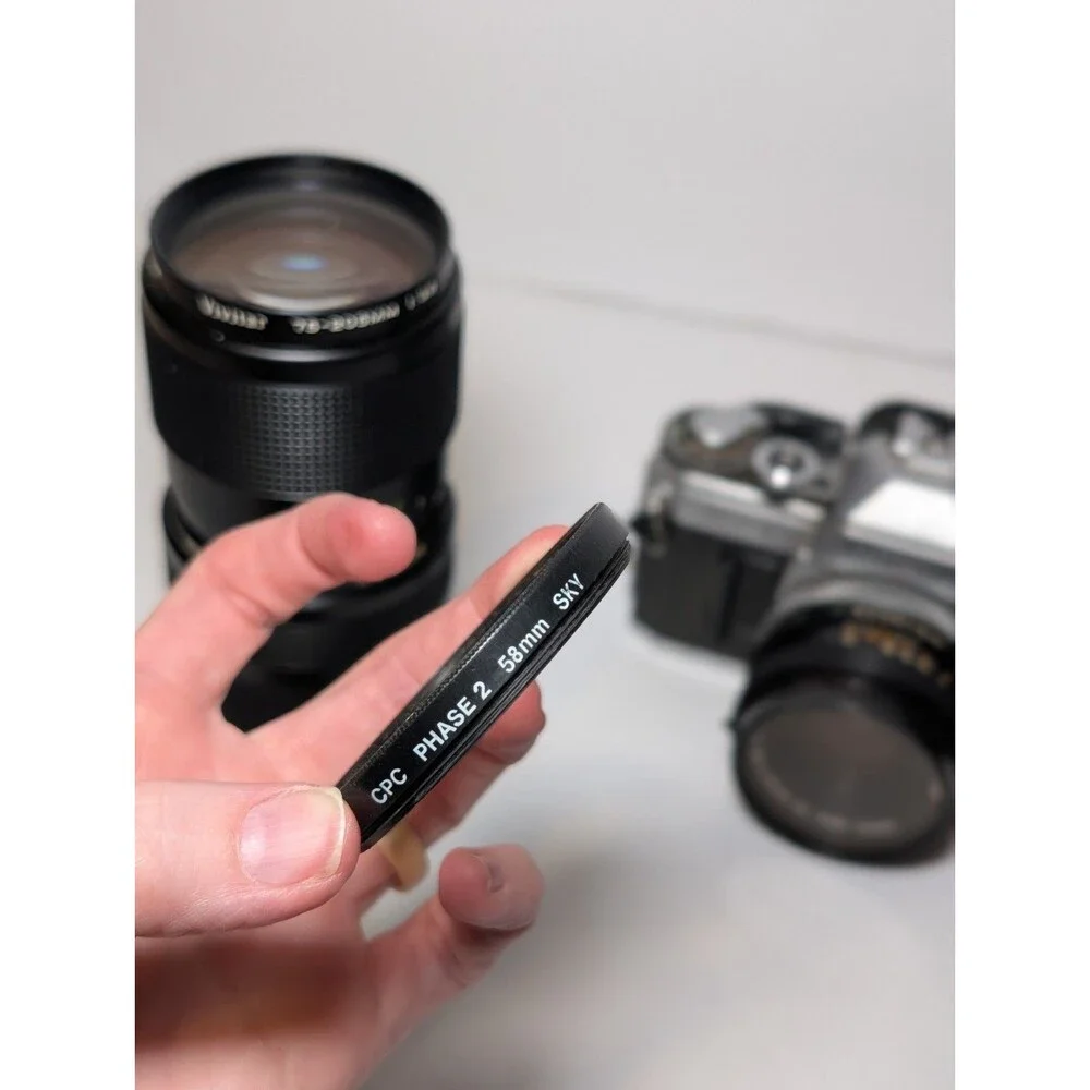 Canon AT-1 35mm Film Camera + 50mm f/1.8 Lens and Vivitar 75-205mm f/3.8 lens